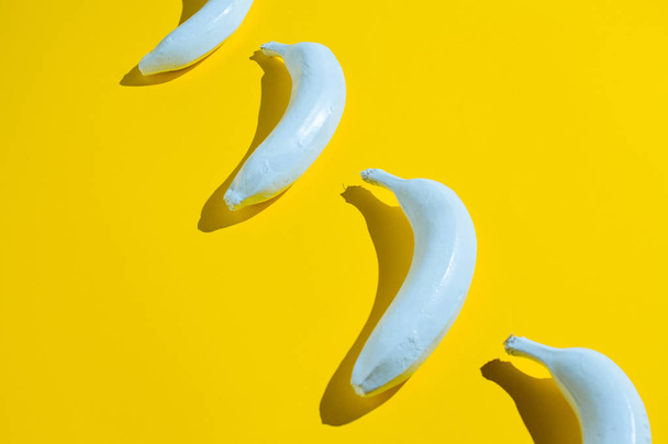 White banana on yellow background - Foto, Bild