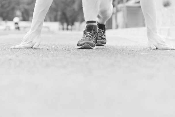 Trainers of runner starting his marathon on flat treadmill - Zdjęcie, obraz