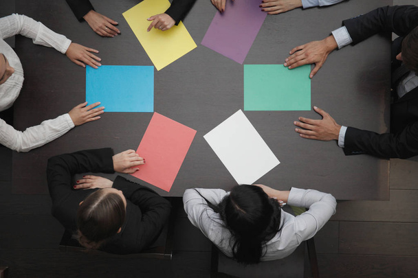 Group of business people with blank colorful paper, new project concept - 写真・画像
