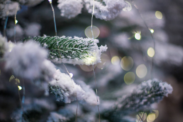 Abstract unfocused backgrounds with Christmas decorations with led light bokeh - close-up photo. - Фото, изображение