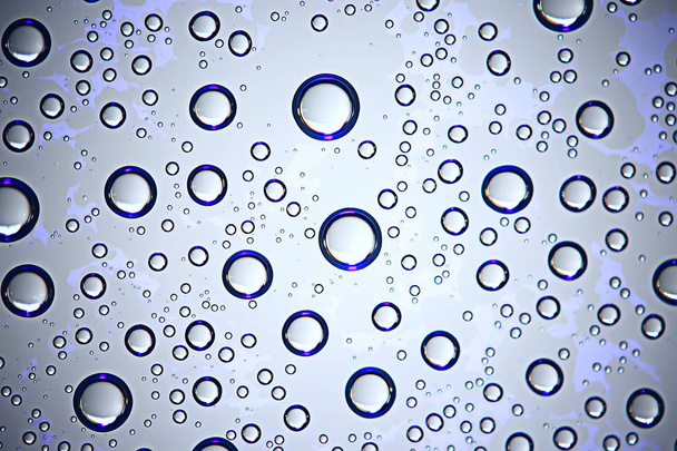 gray wet background, raindrops on window glass, concept of autumn weather - 写真・画像