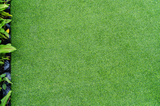 Felülnézet fotó, zöld műfüves textúra háttér - Fotó, kép