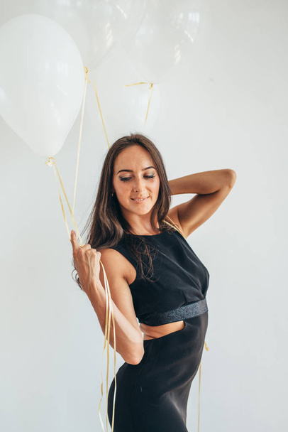 Beautiful woman posing with balloons Holiday, celebration - Photo, Image