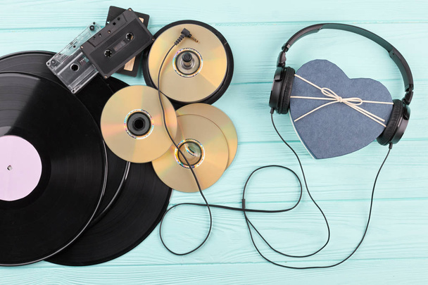 Vinyl records, discs, cassettes and headphones. - Photo, Image