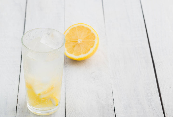 Lemon juice detox water. Mineral water infused with lemons. - Fotoğraf, Görsel