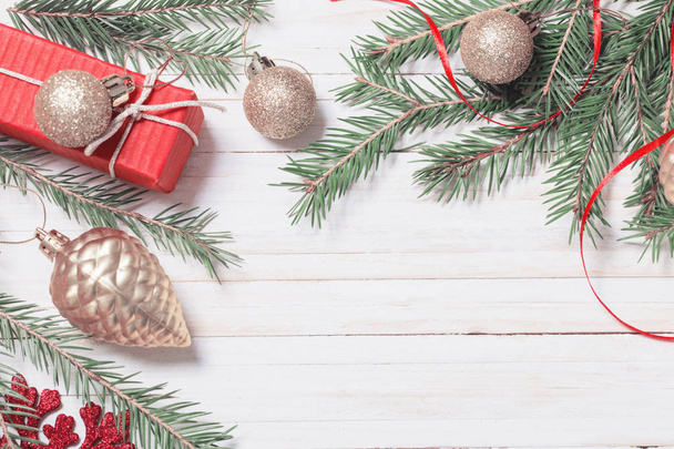 Christmas decoration on white wooden background - Photo, image