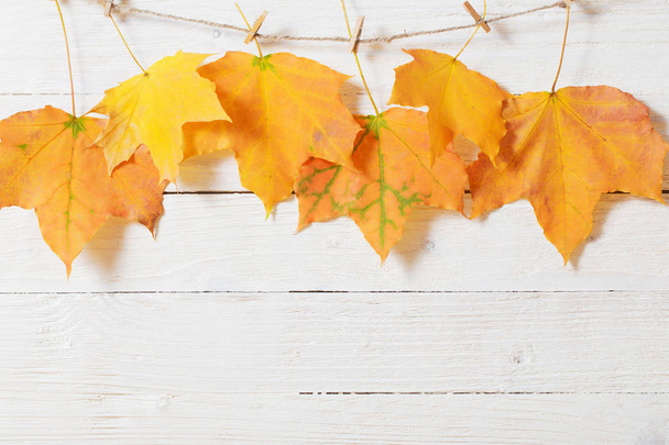 colour autumn leaves on wooden background - Zdjęcie, obraz
