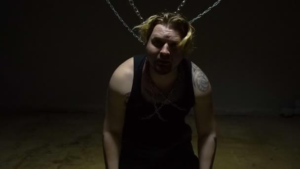 Scared captive bound in chains - Footage, Video