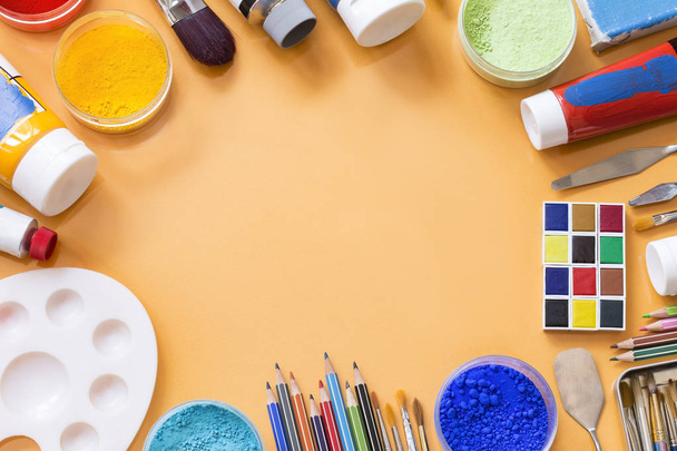 Various painting equipment on yellow background - Photo, Image