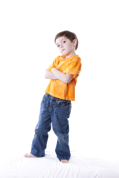 Caucasian little boy standing with his arms crossed - Foto, Bild