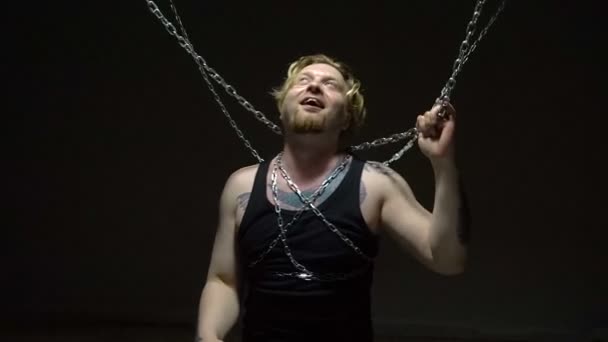 Frightened prisoner bound in chains - Footage, Video