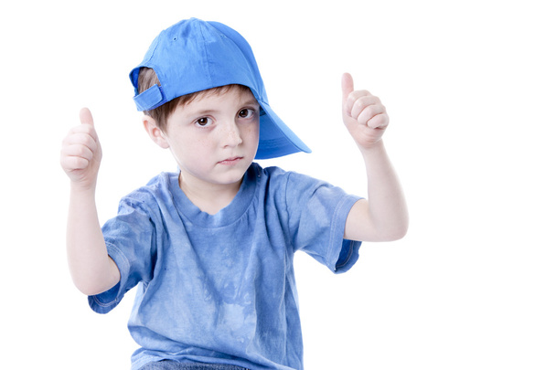 Caucasian little boy giving a thumbs up - 写真・画像