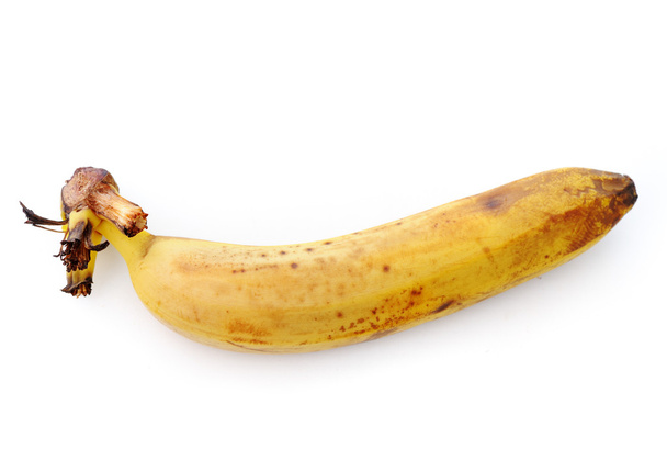 Overripe banana fruit. Isolated over white. - Fotó, kép