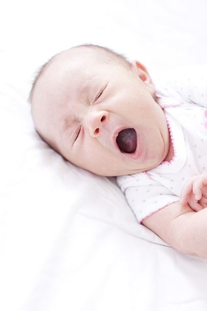 Caucasian newborn baby yawning - Fotó, kép