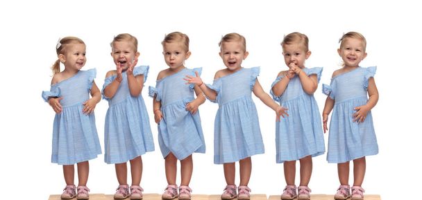 Collage rangschikking van een schattig klein meisje in blauwe jurk in verschillende poses op witte achtergrond - Foto, afbeelding