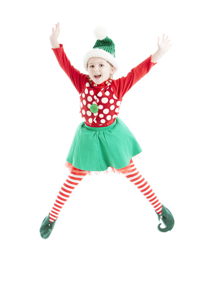 One of santas christmas elves jumps with yuletide joy - Photo, Image