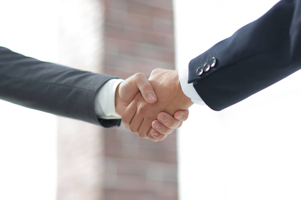 closeup.handshake de los socios comerciales
 - Foto, imagen