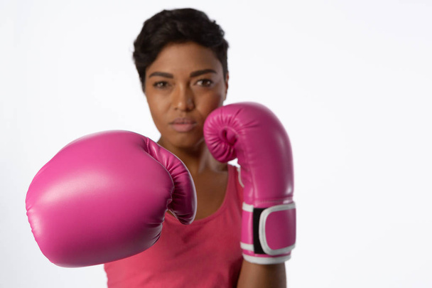 Woman in boxing gloves isolated white background - Valokuva, kuva