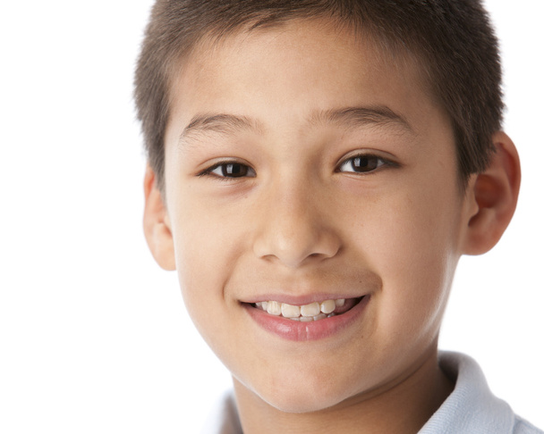 A closeup headshot of a caucasian smiling little real boy - Foto, Bild