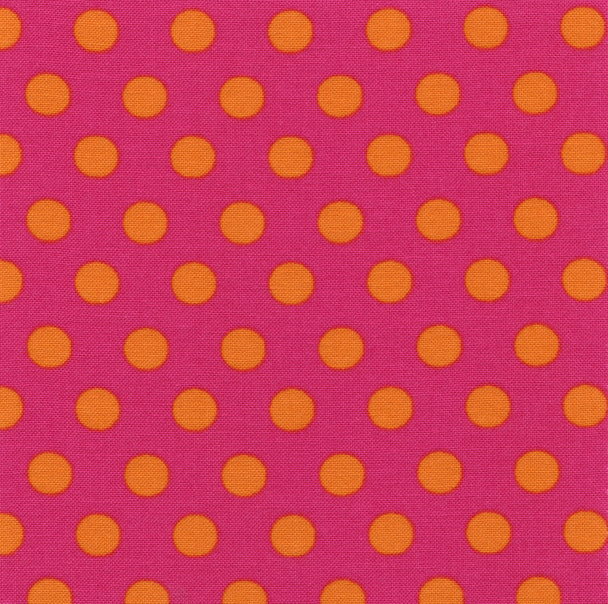 A high resolution pink fabric with orange polka dots - Фото, изображение