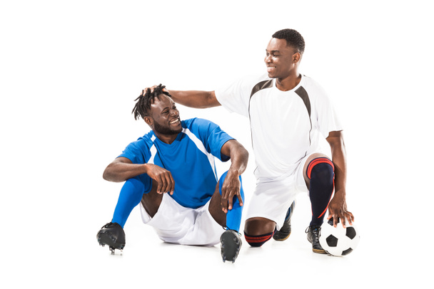 heureux joueurs de football afro-américains s'amuser isolé sur blanc
 - Photo, image