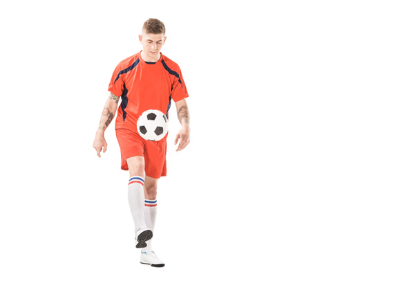 athletic young sportsman in sportswear playing with soccer ball isolated on white - Photo, Image