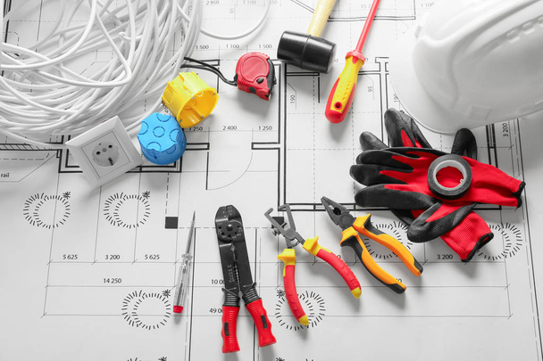 Different electrician's supplies on electrical scheme - Photo, Image