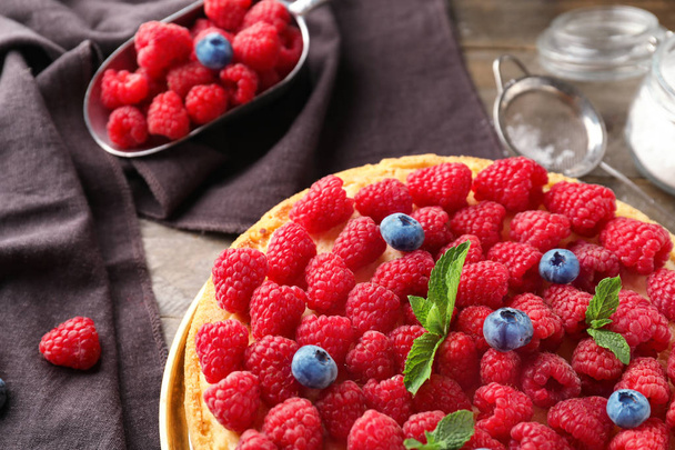 Delicious raspberry cheesecake on table, closeup - Photo, Image