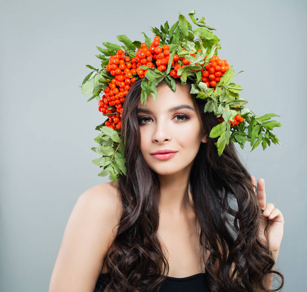 Woman in wreath. Female model with healthy skin, curly hairstyle, natural makeup. Haircare concept - Fotoğraf, Görsel