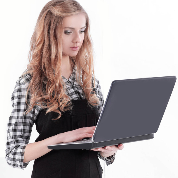 young business woman standing with an open laptop. - Foto, Imagen