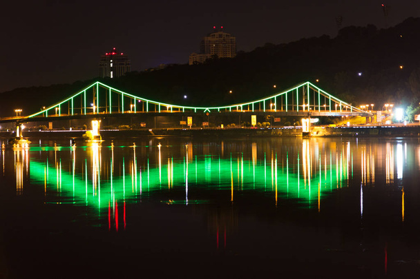 Bright green bridge over the river. Bridge green. - Photo, Image