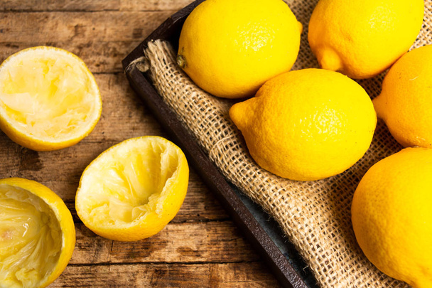 Lemons on a rustic cloth top view - Photo, Image