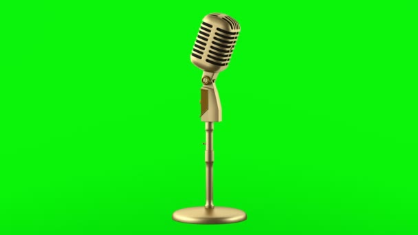 zlaté vintage mikrofon smyčka otočit na pozadí zelených chromakey - Záběry, video