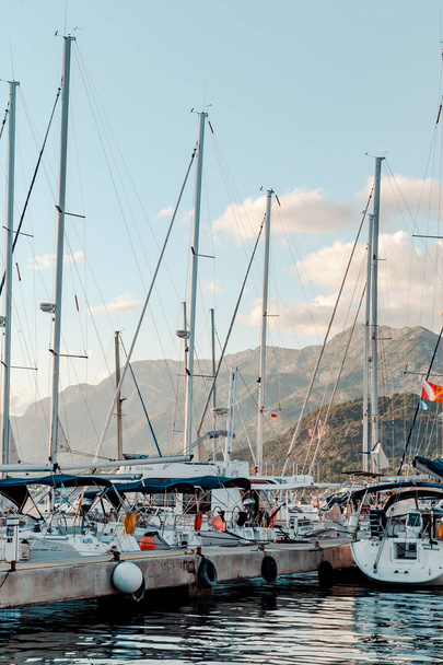 Berth in Bar, Montenegro. Adriatic Sea. Sunny day. Blue sky, rare clouds. Moored yachts. - 写真・画像