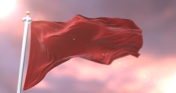Piros zászló integet lassú szél a naplemente, hurok - Felvétel, videó