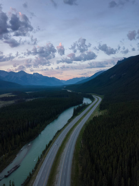 Beautiful aerial landscape view of a Trans-Canada Highway in Canadian Rockies during a vibrant sunny day. Taken in Banff, Alberta, Canada. - Zdjęcie, obraz