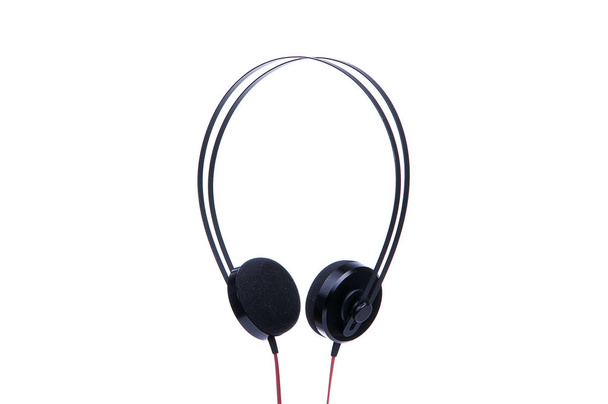 Black headphones isolated on white background. - Zdjęcie, obraz
