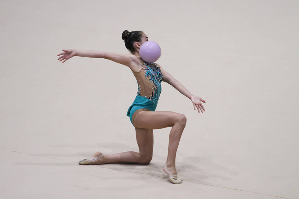ISTANBUL, TURKEY - JUNE 23, 2018: Unknown gymnast performs during Istanbul Rhythmic Cup - Photo, Image
