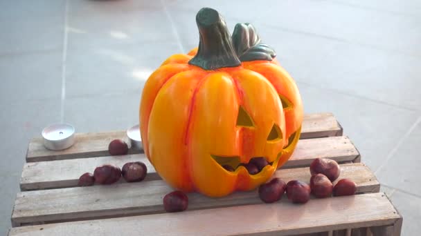 Halloween Pumpkin with Chestnuts Decoration on wooden box - Footage, Video