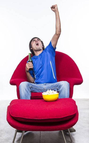 Young Man Shouting and feasting. Full of joy and excitement - 写真・画像