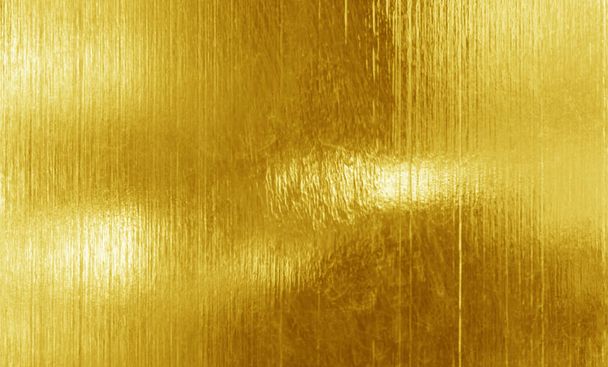 Zlatá kartáčovaná pozadí nebo textury plechů z nerezavějící oceli. - Fotografie, Obrázek