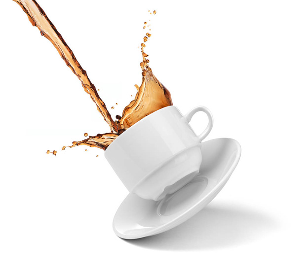 coffee splashing out of a cup isolated on white - Foto, afbeelding