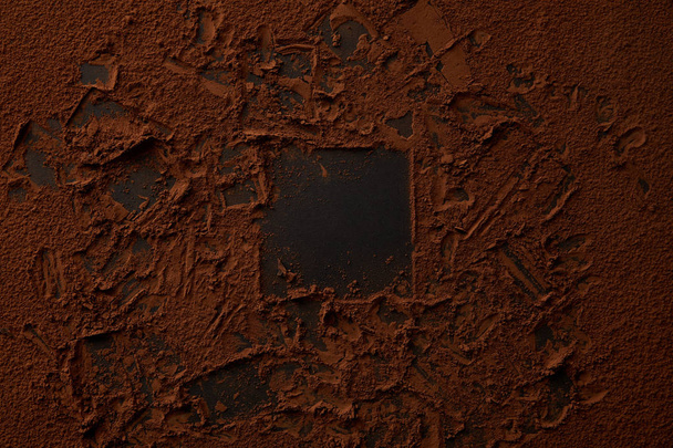 top view of yummy cocoa powder on black background  - Фото, зображення