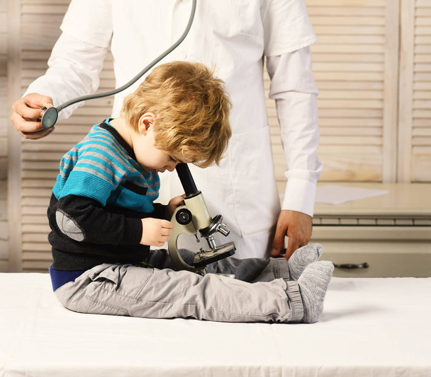Childhood, science and medical education concept. Boy does experiments - Valokuva, kuva