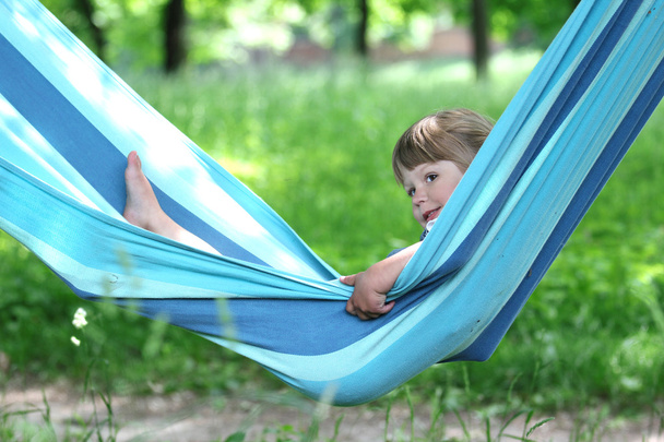 little girl on a hammock - Фото, зображення
