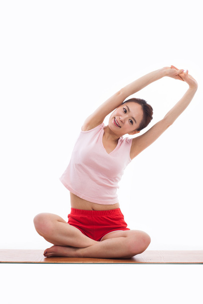 Young Asian woman exercise yoga - Photo, Image