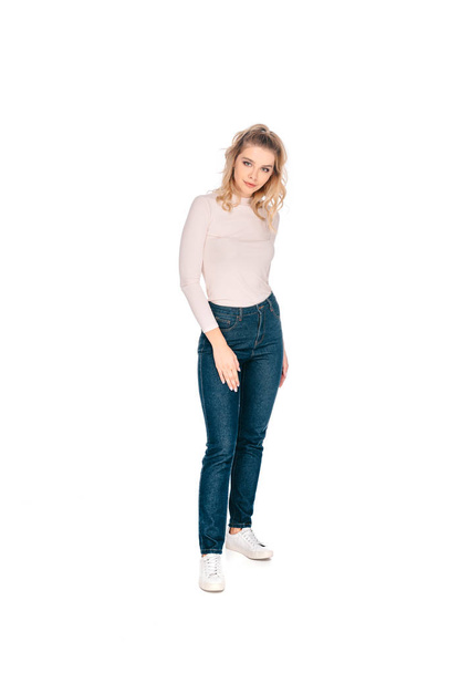 full length view of beautiful young blonde woman looking at camera isolated on white - Foto, Imagem