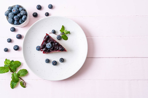 homemade blueberry cheese cake on wood background - Foto, Imagem