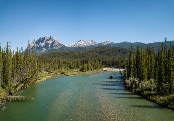 Beautiful aerial panoramic landscape view of Canadian Rockies during a vibrant sunny day. Taken in Banff, Alberta, Canada. - Zdjęcie, obraz