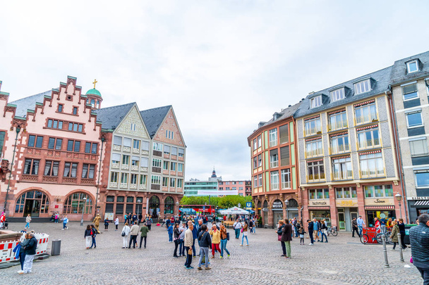 FRANKFURT, GERMANY - SEP 2, 2018: People on Roemerberg square in Frankfurt, Germany. Frankfurt is the fifth-largest city in Germany. - Photo, image